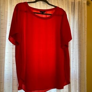 Burnt orange short sleeve blouse.